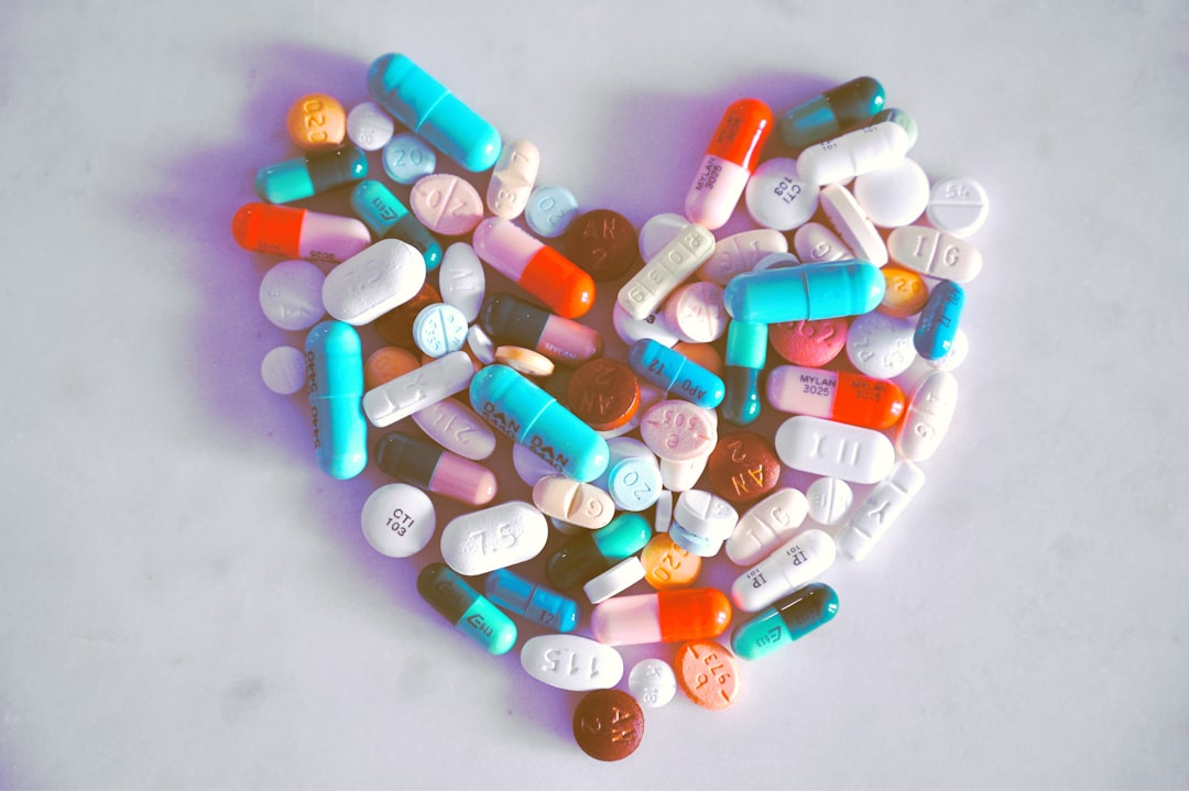 Services A compiled bunch of pills shaped into a heart, because art.